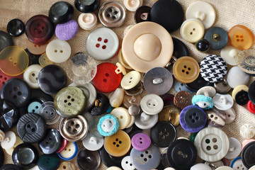 Many different bright vintage and new multicolored sewing buttons background