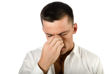 Obraz premium Tears and depression. The young guy is crying.