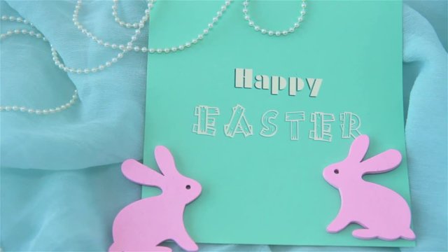 easter greeting card with pink bunnies