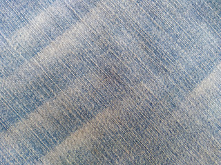 Jeans texture, denim fabric. Denim background texture for design. Blue jeans texture for any background.