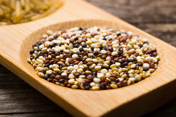 quinoa seeds, old wooden table