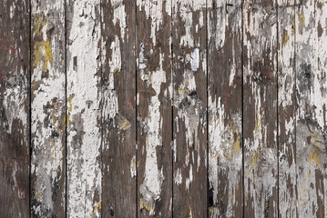 Old wooden shabby surface, boards with remnants of paint - grunge wooden background