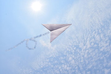 Fototapeta na wymiar paper plane in the sky