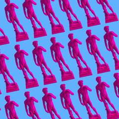 Pattern of pink neon Davids,  masterpiece of Renaissance sculpture created  by Michelangelo....