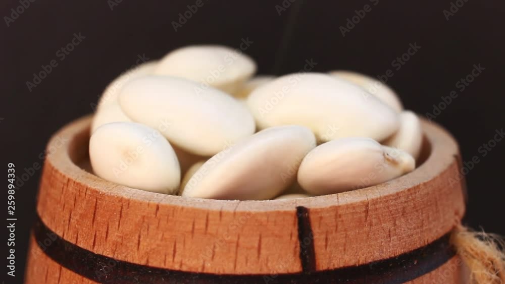 Sticker White beans close up in a barrel