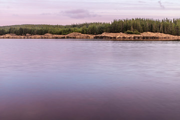 Sunset in Conemara lake with Pine Forest around