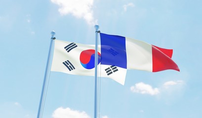 France and South Korea, two flags waving against blue sky. 3d image