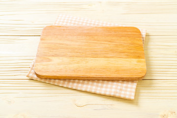 empty cutting wooden board with kitchen cloth