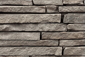 The wall is made of bricks. Background for lettering