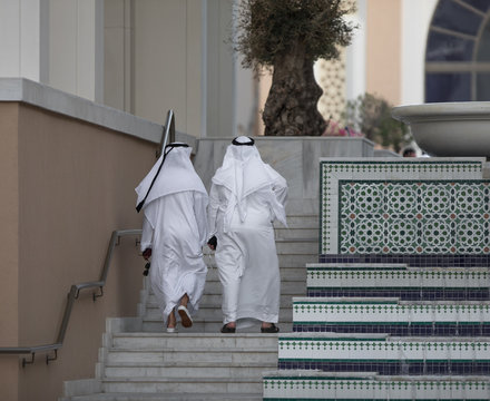 unidentifiable arabic men in white clothes