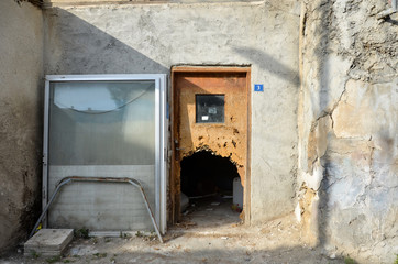 March 8, 2018. Nicosia, Cyprus. Abandoned house with broken door on Turkish side of Nicosia, Cyprus