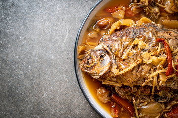 Boiled Carp fish with pickled lettuce