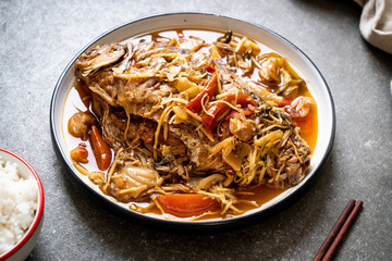 Boiled Carp fish with pickled lettuce