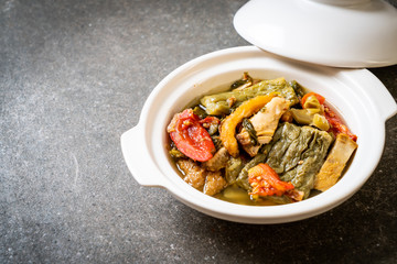 Bitter gourd and preserved mustard green soup with pork