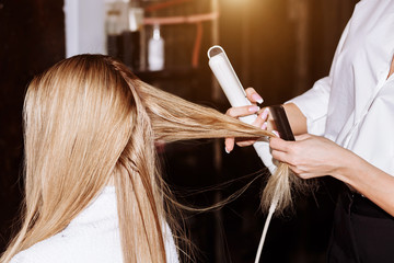 Fototapeta premium Beautiful woman in hair salon