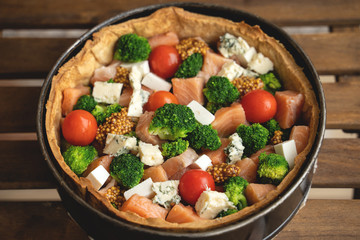 Traditional french pie with bacon and cheese - quiche lorraine.