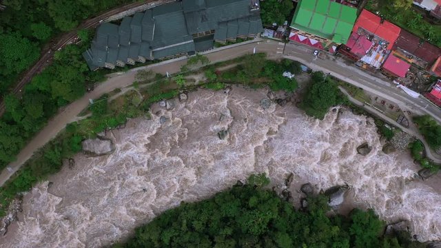 Aerial drone view of Aguas Calientes village and Urubamba river near Machu Picchu in Peru, South America.