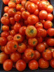 Tomatoes are sold in the market for selling fruits and vegetables.6