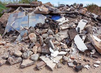 Demolished building debris pile.