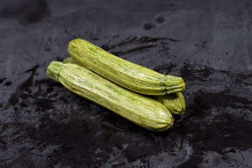 Fresh green wet zucchini.