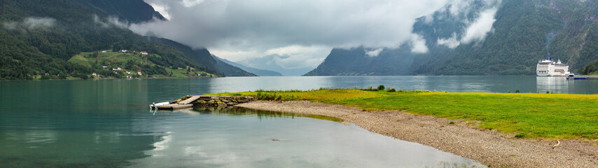 Summer cloudy Lustrafjorden fjord