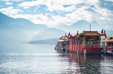 february boat over water at the sun moon lake, taiwan - 259910155