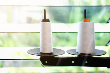White Thread thread on sewing machine
