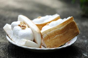 Thai sweet dessert. Coconut ice cream with bread