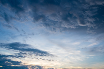 Naklejka na ściany i meble Dramatic sunset dark blue sky and cloudy