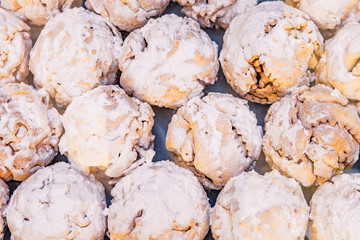 Schneeball (snowball) is a traditional pastry of Franconia (Germany) and a common souvenir from the region of Rothenburg ob der Tauber