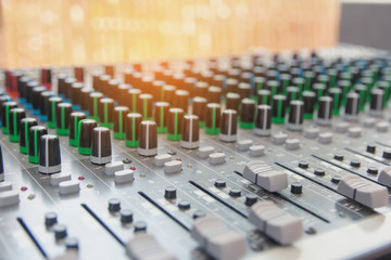 Audio sound mixer control panel.  Sound console buttons for adjust the volume
