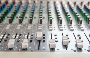 Audio sound mixer control panel.  Sound console buttons for adjust the volume