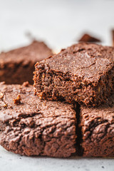 Vegan chocolate brownies on white background.