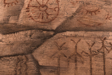 Image of ancient people on the wall of the cave. history of antiquities, archaeology.