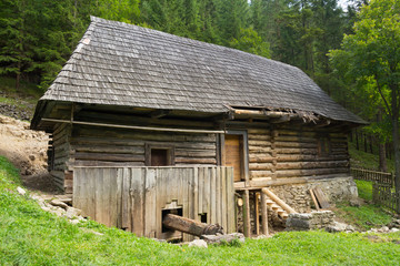 Fototapeta na wymiar old wooden water mill at Kvacianska dolina