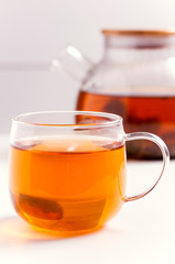 cup of herbal tea on a white background