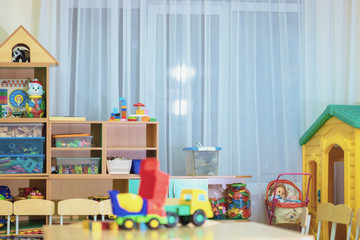 Stylish children's room interior with toys and new furniture