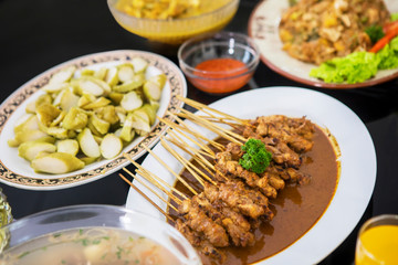Assorted traditional Indonesian dishes on the table
