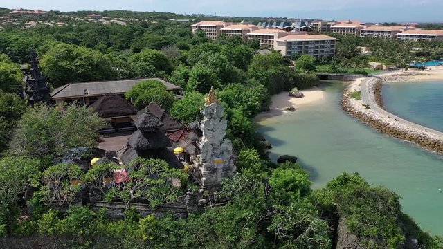 Nusa Dua. Bali / Indonesia - 01 20 2019. A drone&rsquo;s flight over the sea, cliffs and Geger Beach Temple