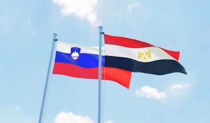 Egypt and Slovenia, two flags waving against blue sky. 3d image