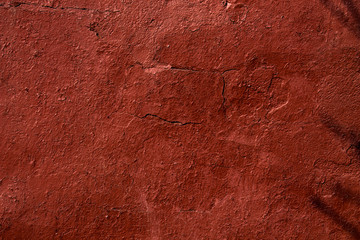 cracked wall painted red