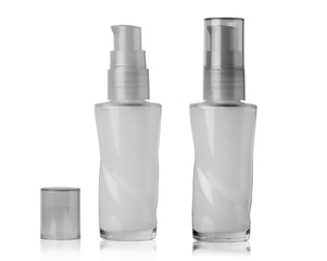 Cosmetic bottles for cream, foam and other cosmetics with a cap and without. Template for your layout design. Mock up
