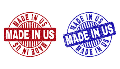 Grunge MADE IN US round stamp seals isolated on a white background. Round seals with distress texture in red and blue colors.