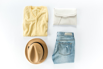 Woman clothes and accessories set on white background top view. modern and casual outfit. fashion,...