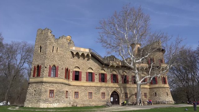 Lednice Valtice Cultural Landscape Area Complex John's Castle Front View with Leafless White Tree and Father Playing with Child in Spring