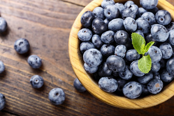 blueberries in a wooden plate
