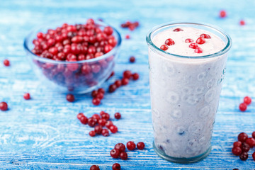 yogurt with cranberries on the table