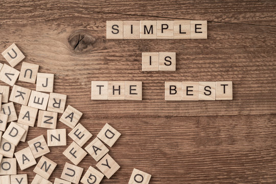 Naklejki Simple is the best slogan written with cube letters