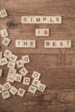Naklejki Simple is the best slogan written with cube letters