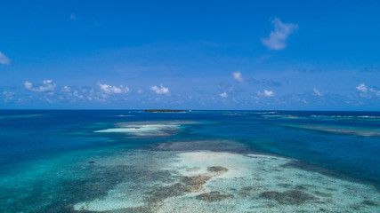 Naklejka na ściany i meble Aerial View to San Blas island of Panama. The San Blas islands of Panama is an archipelago comprising 365 islands and cays of which 49 are inhabited